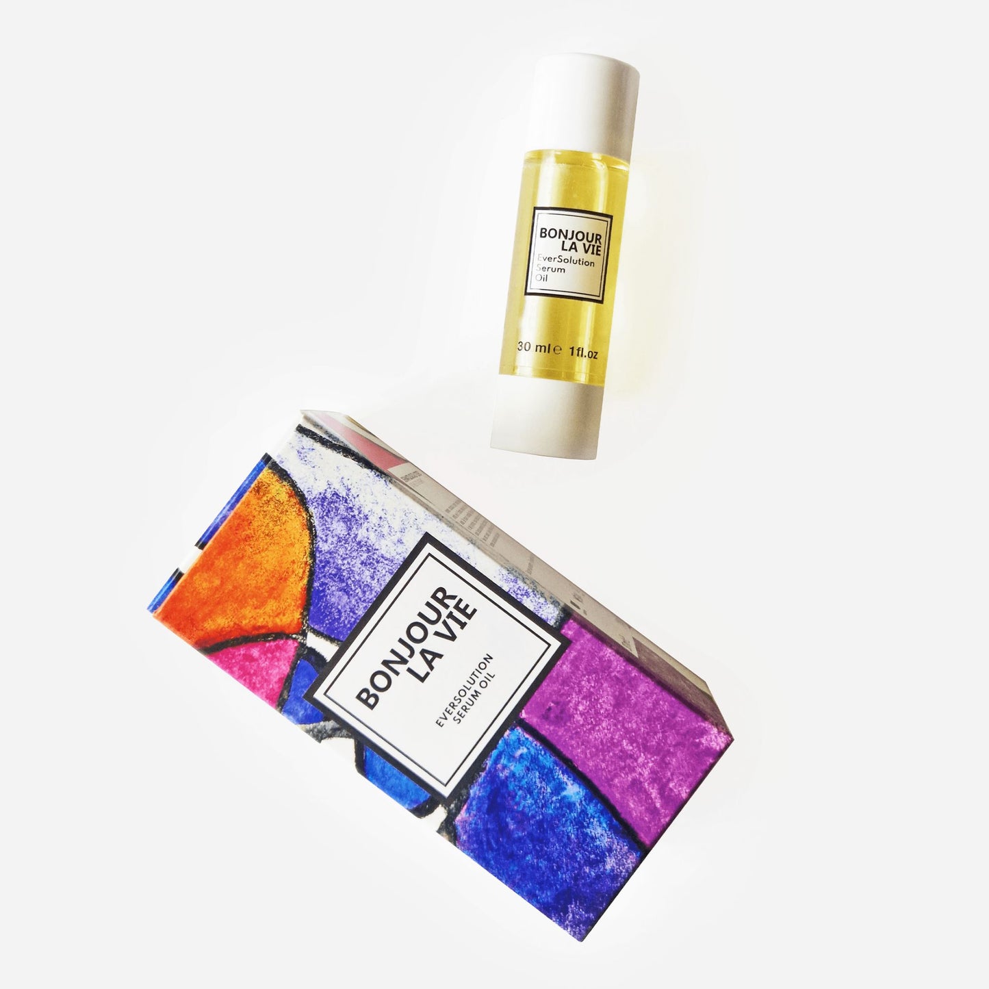 Immagine su fondo bianco del flacone e della scatola colorata con toni blu, porpora e arancione di Eversolution Serum da 30 ml di Bonjour La Vie