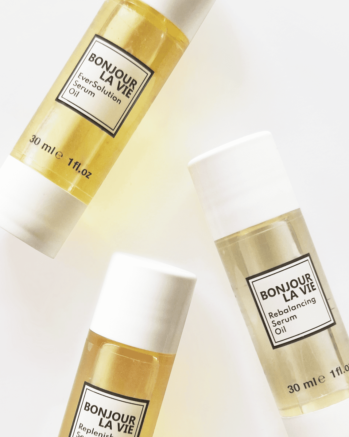 Immagine su fondo bianco dei tre Olio Siero di Bonjour La Vie Replenish Serum Oil, Rebalancing Serum Oil, EverSolution Serum Oil