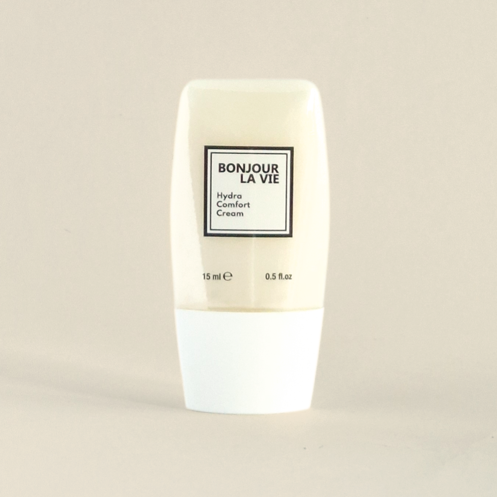 Flacone da 15 ml con tappo bianco e vaso trasparente di Hydra Comfort Cream di Bonjour La Vie.
